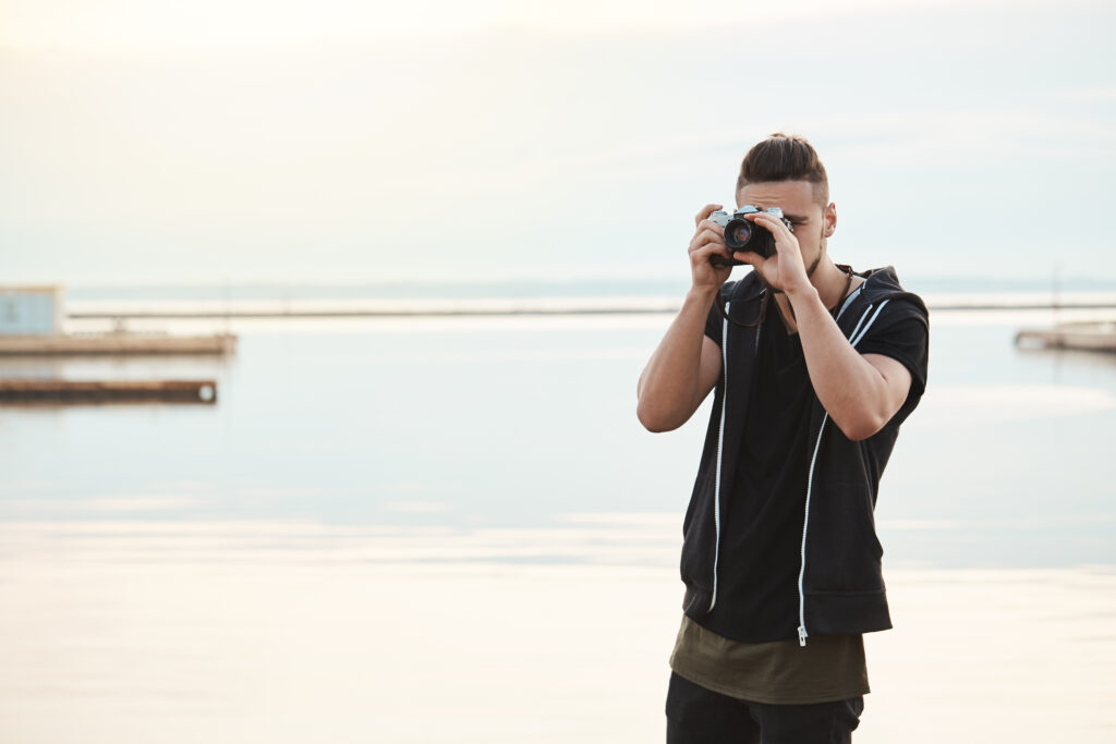 Professional photographer capturing beachside moments