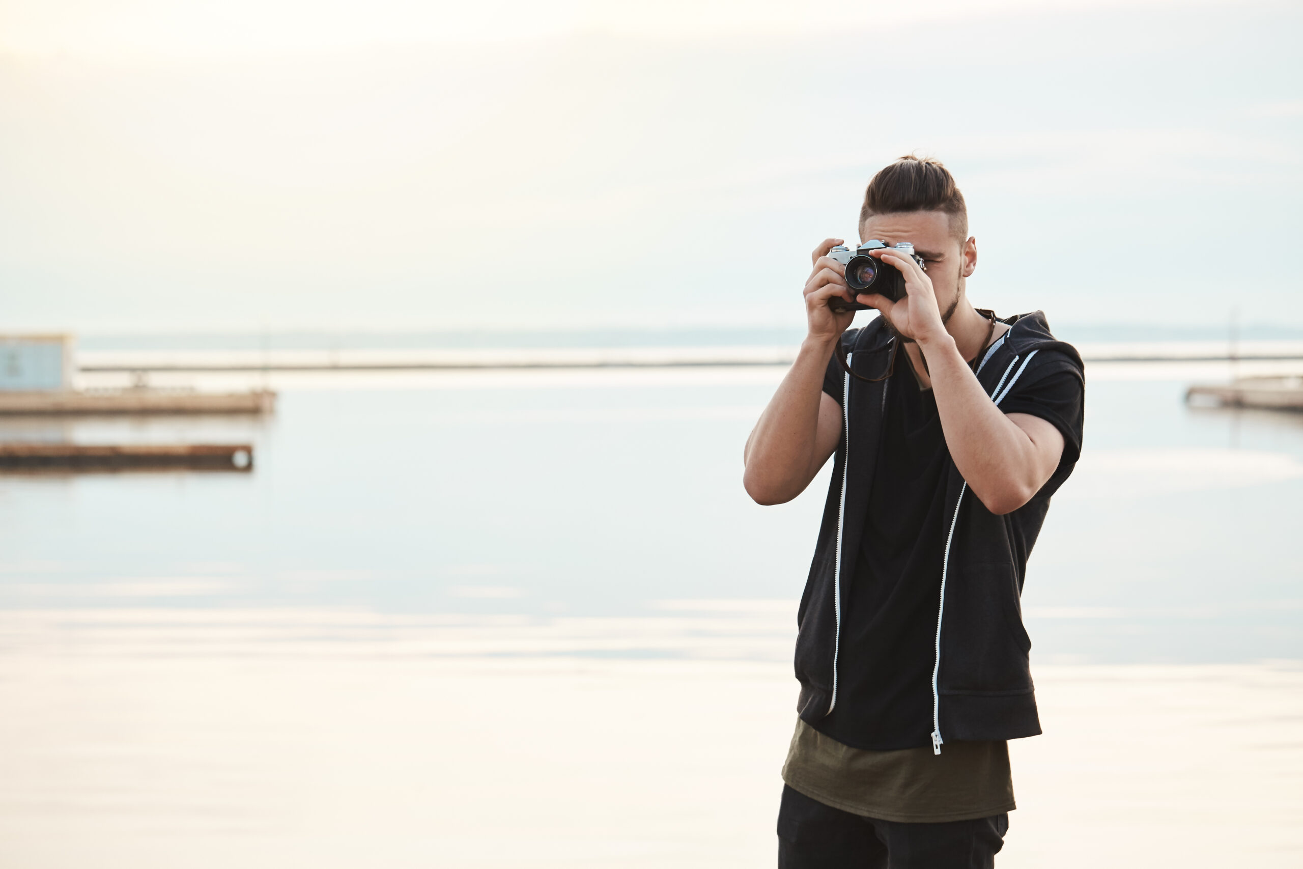 Professional photographer capturing beachside moments