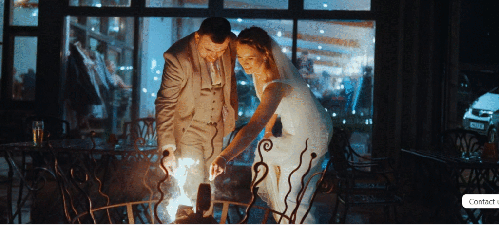 couples standing near the fireplace and having a post-wedding shoot